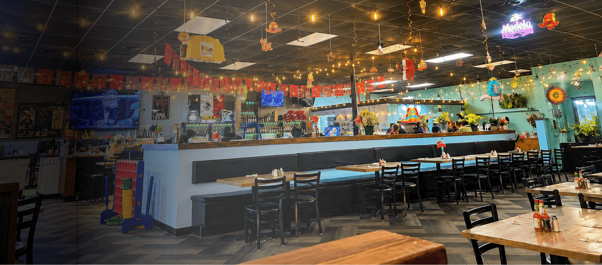 REPLACE → wide warm interior dining shot, colorful table, candles, plates of food (16:9, ≥2000px)